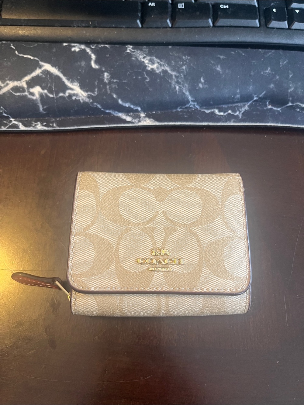 Coach Beige Signature Fold Wallet with Gold Logo with pink leather accents